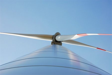 wind turbine under blue sky for alternative energy Photographie de stock - Aubaine LD & Abonnement, Code: 400-04796198