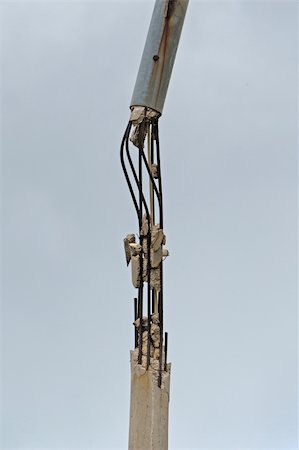 Broken concrete pole and rusty steel bars. Industrial detail. Stock Photo - Budget Royalty-Free & Subscription, Code: 400-04796248