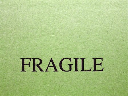 Detail of a fragile corrugated cardboard packet Stock Photo - Budget Royalty-Free & Subscription, Code: 400-04796367
