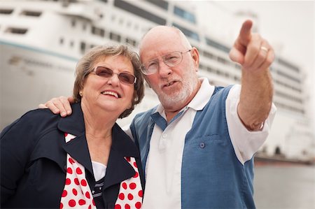 Senior Couple On Shore in Front of Cruise Ship While on Vacation. Stock Photo - Budget Royalty-Free & Subscription, Code: 400-04796633