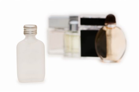 simsearch:700-06892568,k - Bottles of perfume isolated on the white Stock Photo - Budget Royalty-Free & Subscription, Code: 400-04796697