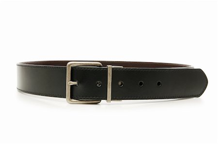 Leather belt isolated on the white background Stock Photo - Budget Royalty-Free & Subscription, Code: 400-04796759