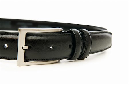 Leather belt isolated on the white background Stock Photo - Budget Royalty-Free & Subscription, Code: 400-04796762