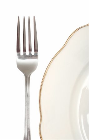 fork and plate, photo on the white background Stock Photo - Budget Royalty-Free & Subscription, Code: 400-04797644