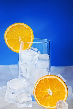 simsearch:400-07061592,k - Empty Glass with orange slices stand on ice plate Stock Photo - Budget Royalty-Free & Subscription, Code: 400-04797772