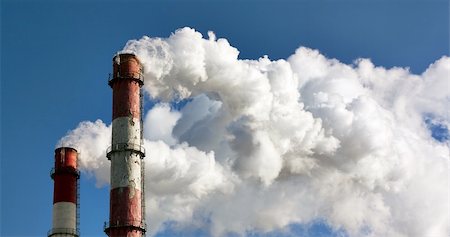 Two smoking towers against the pure blue sky. Fotografie stock - Microstock e Abbonamento, Codice: 400-04797822