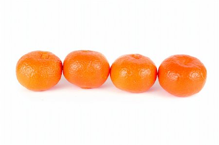 simsearch:400-07613620,k - Mandarines on the white background photo in studio Stockbilder - Microstock & Abonnement, Bildnummer: 400-04798415