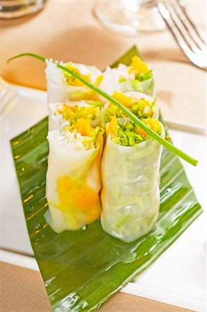 fresh tipycal vietnamese style summer rolls,on a palm leaf Stock Photo - Budget Royalty-Free & Subscription, Code: 400-04798473