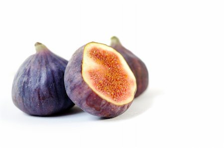 simsearch:400-07718938,k - This photograph represent fresh ripe figs isolated on white background Fotografie stock - Microstock e Abbonamento, Codice: 400-04799099