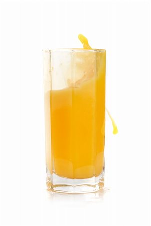 simsearch:400-04823336,k - Fresh squeezed pouring citrus juice with fruits isolated on a white background Foto de stock - Super Valor sin royalties y Suscripción, Código: 400-04799281