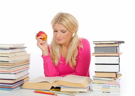 simsearch:400-04351619,k - young pretty smart woman with lots of books reading and study. isolated on white background Foto de stock - Super Valor sin royalties y Suscripción, Código: 400-04799578