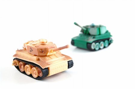 simsearch:640-03258222,k - toy tank isolated on a white background. Foto de stock - Super Valor sin royalties y Suscripción, Código: 400-04790004