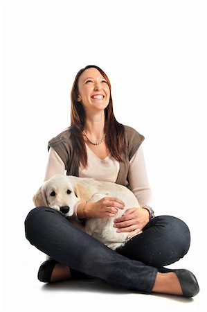 simsearch:400-04283000,k - purebred puppy golden retriever and laughing girl in front of a white background Stock Photo - Budget Royalty-Free & Subscription, Code: 400-04790063