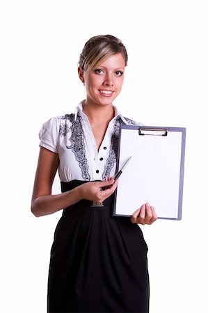 Portrait of a happy businesswoman pointing at white blank card against. Business woman standing beside billboard Stock Photo - Budget Royalty-Free & Subscription, Code: 400-04790078
