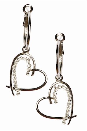 simsearch:400-05297829,k - Pair of earrings isolated on the white background Photographie de stock - Aubaine LD & Abonnement, Code: 400-04790436