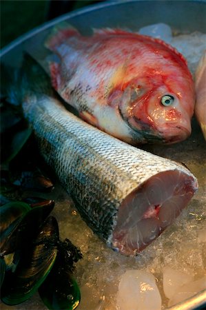 Fresh fish in ice on the market Stock Photo - Budget Royalty-Free & Subscription, Code: 400-04790503