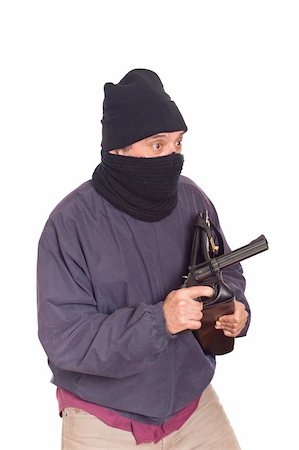 simsearch:400-08551381,k - Thief Aiming a Gun on a Robbery Fotografie stock - Microstock e Abbonamento, Codice: 400-04790602