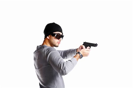 simsearch:400-04539832,k - Portrait of young trendy african man posing with handgun Foto de stock - Royalty-Free Super Valor e Assinatura, Número: 400-04790765