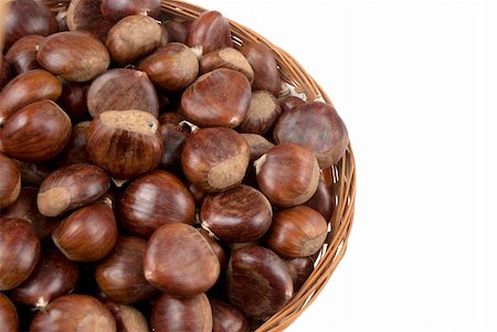 simsearch:400-05709386,k - Wicker basket with chestnuts isolated on white background. Stock Photo - Budget Royalty-Free & Subscription, Code: 400-04790777