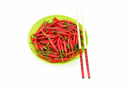 simsearch:400-04288181,k - Hot peppers with chopsticks and plate Photographie de stock - Aubaine LD & Abonnement, Code: 400-04790918