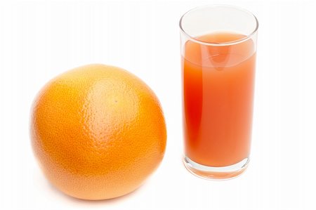 grapefruit with glass of grapefruit juice Foto de stock - Royalty-Free Super Valor e Assinatura, Número: 400-04791175