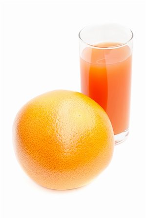 grapefruit with glass of grapefruit juice Foto de stock - Royalty-Free Super Valor e Assinatura, Número: 400-04791171