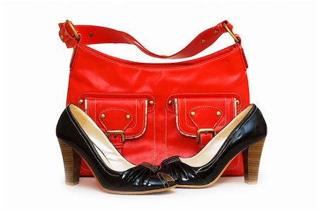 simsearch:400-04792219,k - Red bag and black shoes isolated on white Stock Photo - Budget Royalty-Free & Subscription, Code: 400-04791475