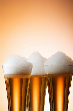 simsearch:695-05774838,k - Beer glasses against the colorful gradient background Stock Photo - Budget Royalty-Free & Subscription, Code: 400-04791592