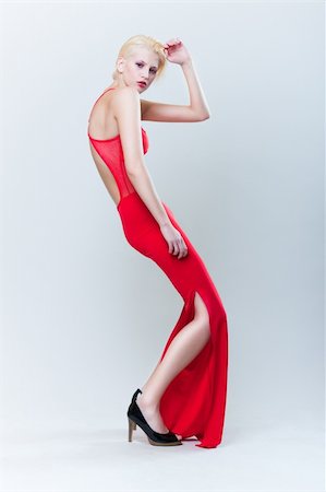 attractive blond girl in red dress Photographie de stock - Aubaine LD & Abonnement, Code: 400-04791783