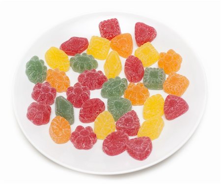 simsearch:400-06135772,k - Fruit jellies on plate insulated on white background Fotografie stock - Microstock e Abbonamento, Codice: 400-04792179