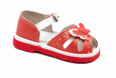 simsearch:400-05701597,k - Red leather baby sandal on white background Foto de stock - Royalty-Free Super Valor e Assinatura, Número: 400-04792196