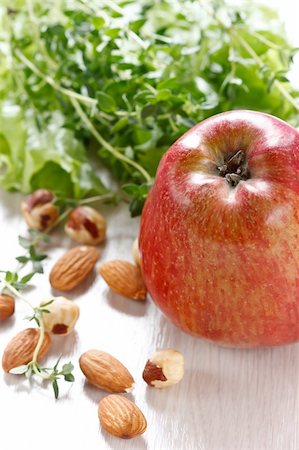 Healthy food concept. Apple, salad and nuts. Stock Photo - Budget Royalty-Free & Subscription, Code: 400-04792214