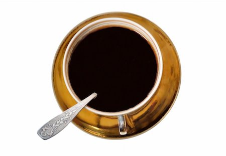 Coffee cup with a silver spoon isolated on white Stockbilder - Microstock & Abonnement, Bildnummer: 400-04792402