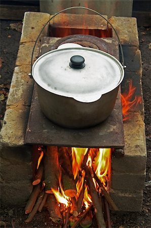 simsearch:400-06066831,k - Cooking of food outdoors in summer heat Photographie de stock - Aubaine LD & Abonnement, Code: 400-04792429