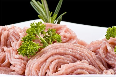 rosemary sprig - Bowl of raw minced pork with herbs Stock Photo - Budget Royalty-Free & Subscription, Code: 400-04792499