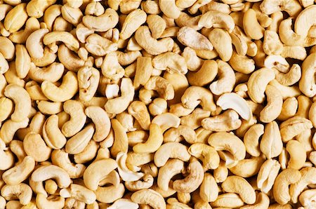 simsearch:400-07210943,k - Cashew nuts arranged at the background Stock Photo - Budget Royalty-Free & Subscription, Code: 400-04792896