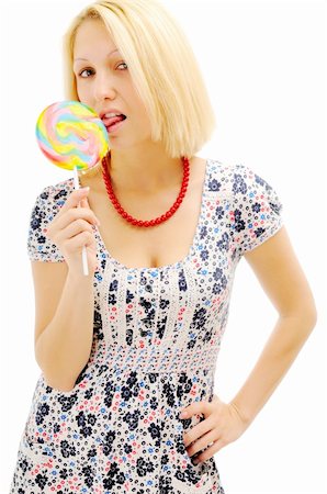 Attractive blonde licking lollipop Stock Photo - Budget Royalty-Free & Subscription, Code: 400-04793080
