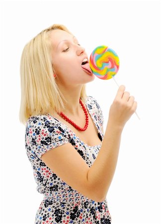 Attractive blonde licking lollipop Stock Photo - Budget Royalty-Free & Subscription, Code: 400-04793082