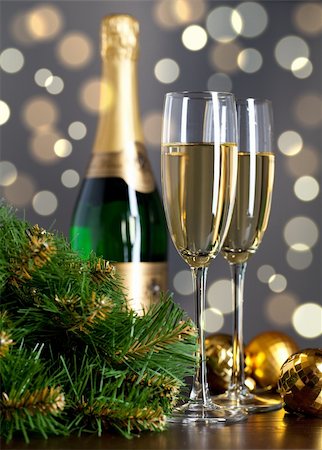 Two full glasses of champagne over color background Stock Photo - Budget Royalty-Free & Subscription, Code: 400-04793139
