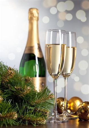 Two full glasses of champagne over color background Stock Photo - Budget Royalty-Free & Subscription, Code: 400-04793142