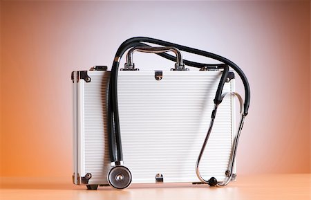 Doctor's case with stethoscope against colorful background Stock Photo - Budget Royalty-Free & Subscription, Code: 400-04793678