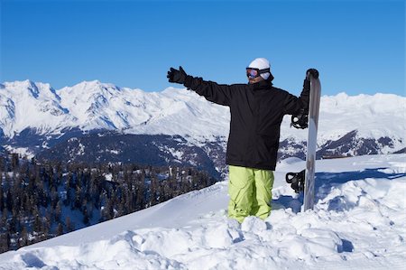 simsearch:400-04289173,k - Guy holding snowboard and looking his right Stock Photo - Budget Royalty-Free & Subscription, Code: 400-04793859