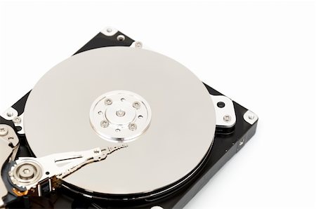 simsearch:400-03992953,k - Opened computer harddisk isolated on white background Stock Photo - Budget Royalty-Free & Subscription, Code: 400-04804062