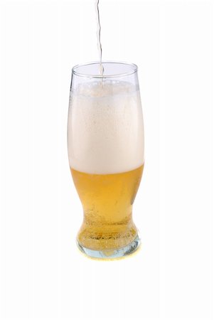 simsearch:700-00182567,k - Lung of golden colour beer in a glass. Stockbilder - Microstock & Abonnement, Bildnummer: 400-04804788