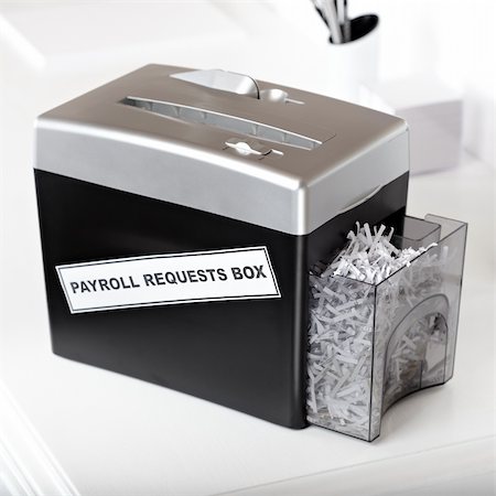 shredded document - shredder with funny label on it on a office desk Stock Photo - Budget Royalty-Free & Subscription, Code: 400-04804782