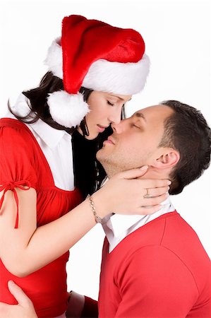 simsearch:400-04805110,k - Young couple in love dressed in red christmas clothes Stock Photo - Budget Royalty-Free & Subscription, Code: 400-04805108