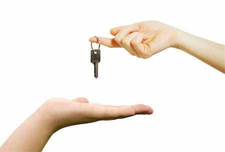 simsearch:400-04350998,k - hand holds a key isolated on white Stock Photo - Budget Royalty-Free & Subscription, Code: 400-04805219