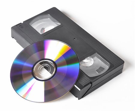 ruslan5838 (artist) - Picture of videocassette and disk on a white background Stock Photo - Budget Royalty-Free & Subscription, Code: 400-04805461