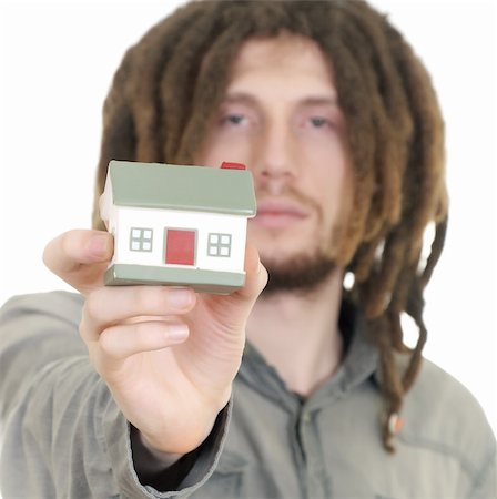 simsearch:400-06855814,k - man holding a small house in his hands isolated on white Foto de stock - Royalty-Free Super Valor e Assinatura, Número: 400-04805632