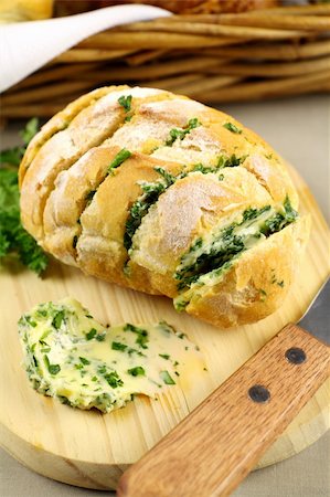simsearch:400-05255035,k - Fresh baked sliced herb and garlic roll from the oven. Stock Photo - Budget Royalty-Free & Subscription, Code: 400-04805995